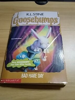 Scholastic Goosebumps Paperback with White Bunny Artwork and Yellow Accents